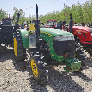 Usado John Deere 484 trator com carregadoras frontais